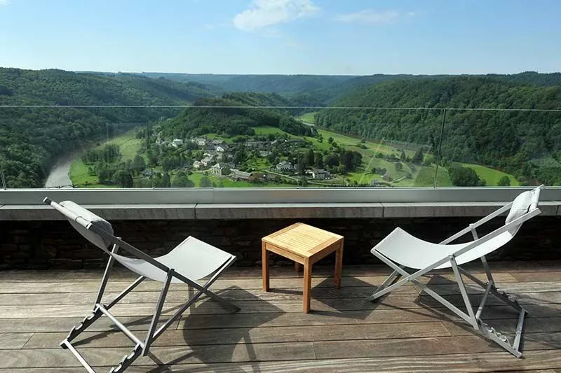 Loungers on the south facing terrace above the valley